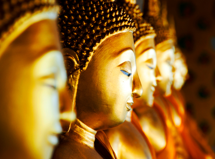 Row of Buddhas at Wat Arun, Bangkok, Thailand.